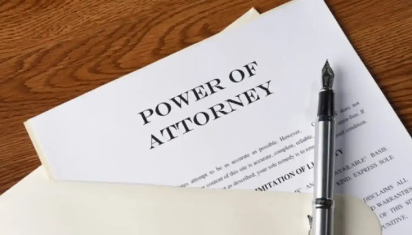 Notary public fees in Dubai: what you pay and why 2 A power of attorney document with a pen